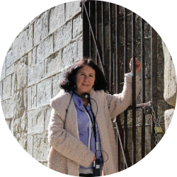Joan stands among the ruins of the Eastern State Penitentiary in Philadelphia, Penn., during a press trip in October.